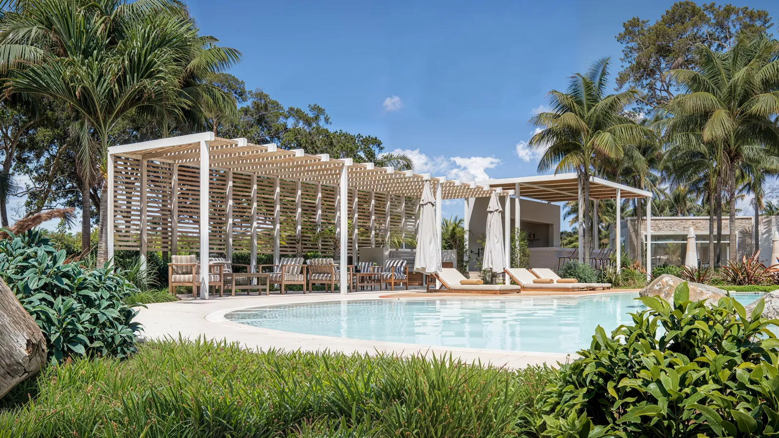 Social area with a pergola by the pool